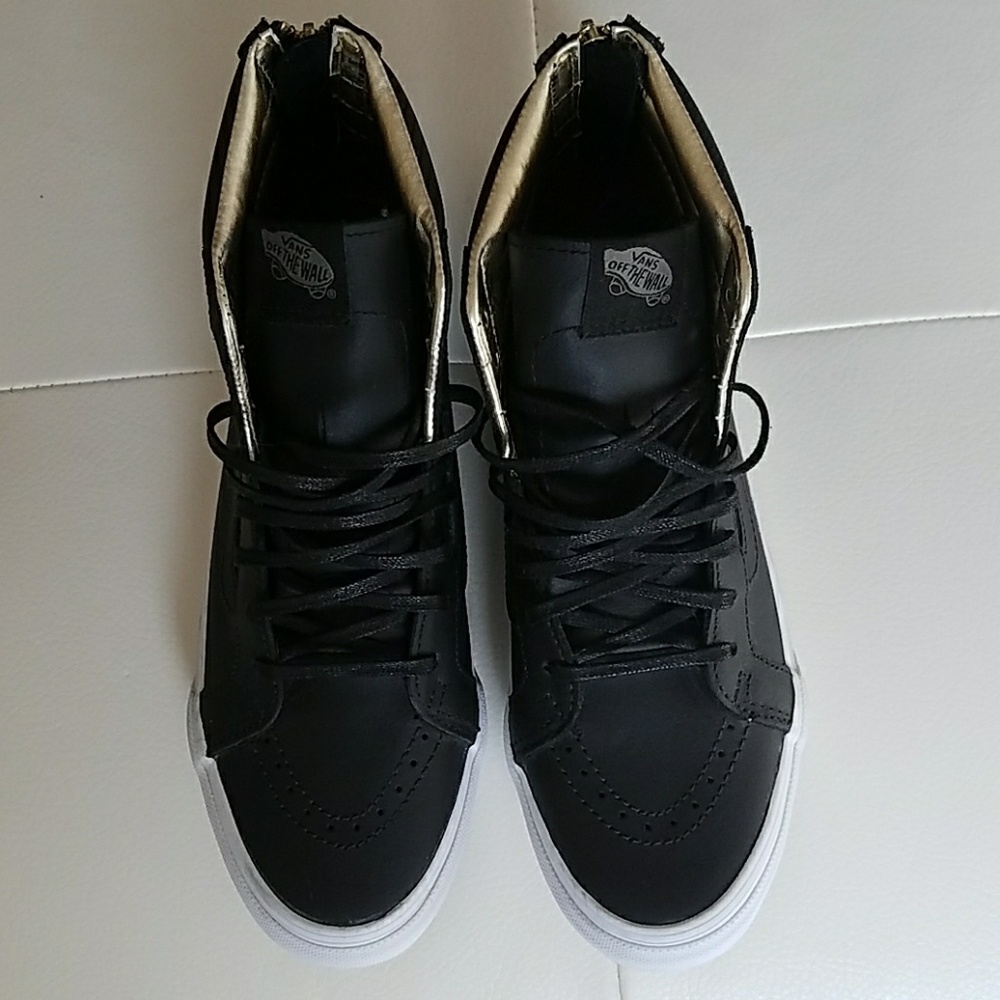 Vans high top sneakers